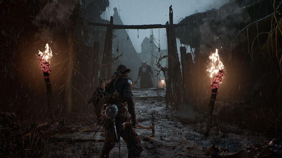 Hooded warrior approaching a rain-soaked village gate lit by torches, a pale figure waiting ahead